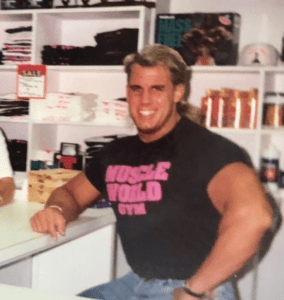Eric Stehle wearing a muscle world gym t-shirt
