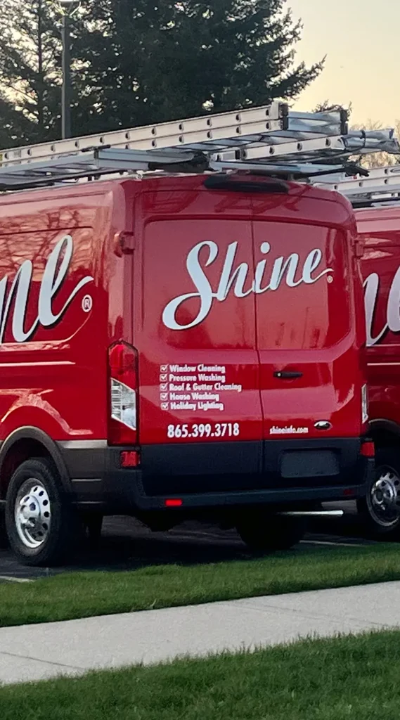 Back of a Shine van with the logo on it