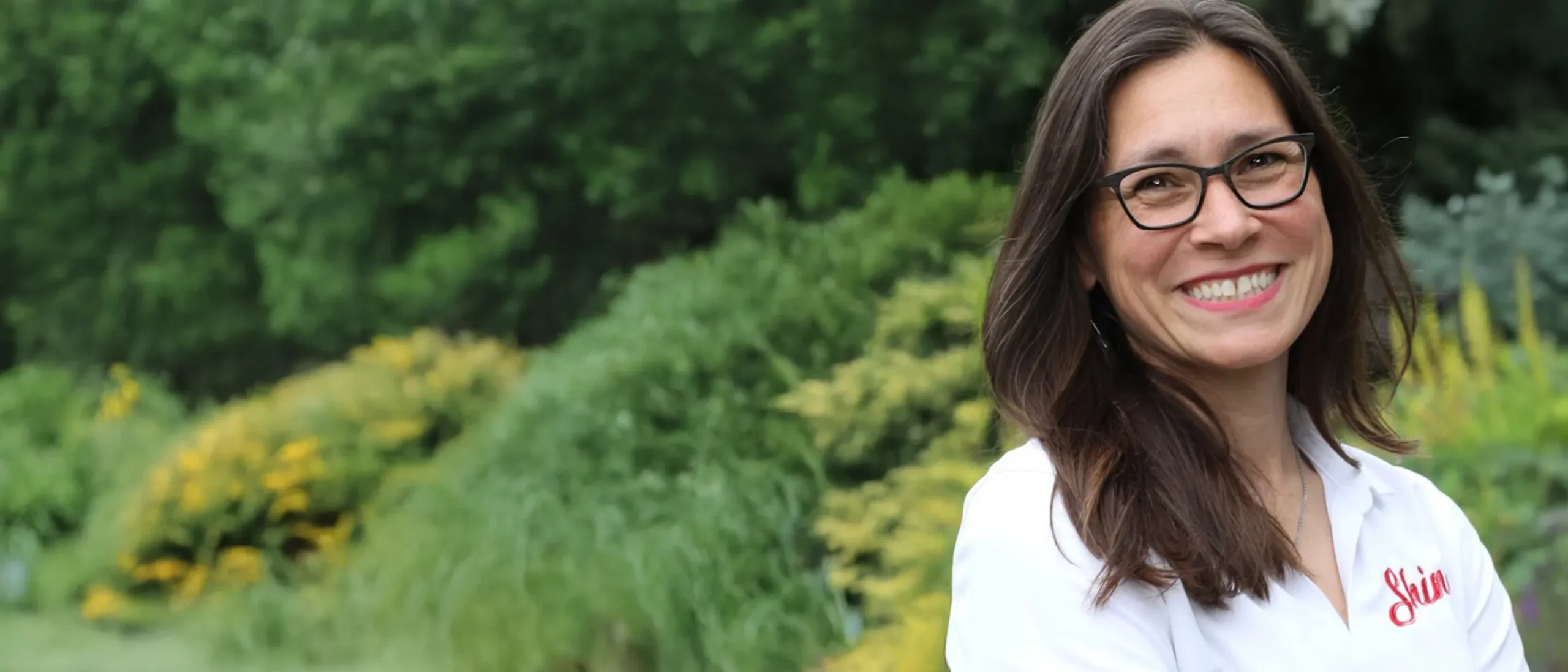 Shine Franchise team member wearing branded apparel, representing a purpose-driven property care franchise.